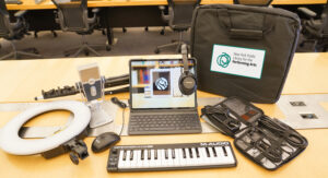 Contents of The New York Public Library for the Performing Arts' Tech Kits for Performing Artists including laptop keyboard, ringlight, etc. 