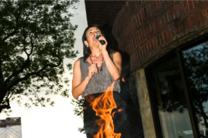 The choreographer Emily Johnson doing a land acknowledgment at Abrons Art Center in 2018.Credit...Dolly Faibyshev for The New York Times