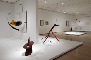 Installation view of “Alexander Calder: Modern From the Start” at the Museum of Modern Art. From left, in the foreground, “White Panel,” “Gibraltar” and “Apple Monster.” 