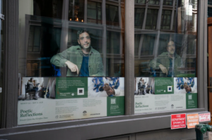 Sean Hewitt reciting “Queens” by J.M. Synge in the digital installation “Poetic Reflections:Words Upon the Window Pane,” at the Irish Repertory Theater’s front windows.