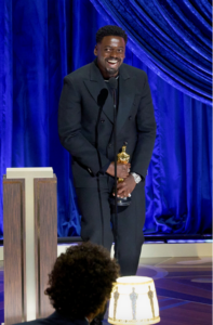 Daniel Kaluuya accepting the award for best supporting actor for his role as Fred Hampton in “Judas and the Black Messiah.”